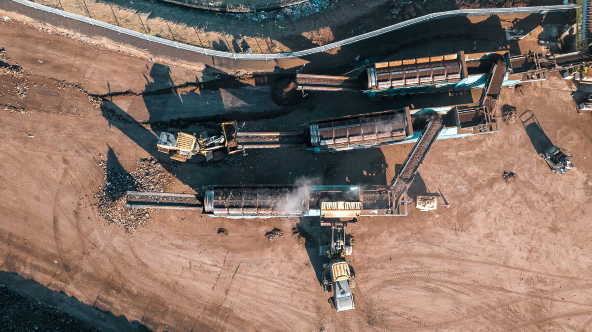 Aerial view of Phoenix 3300 trommel screeners working.