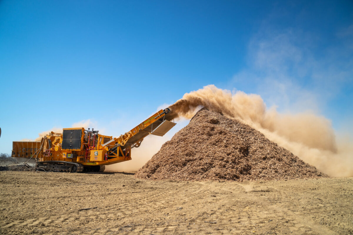 CBI 6800CT Horizontal Grinder producing mulch 